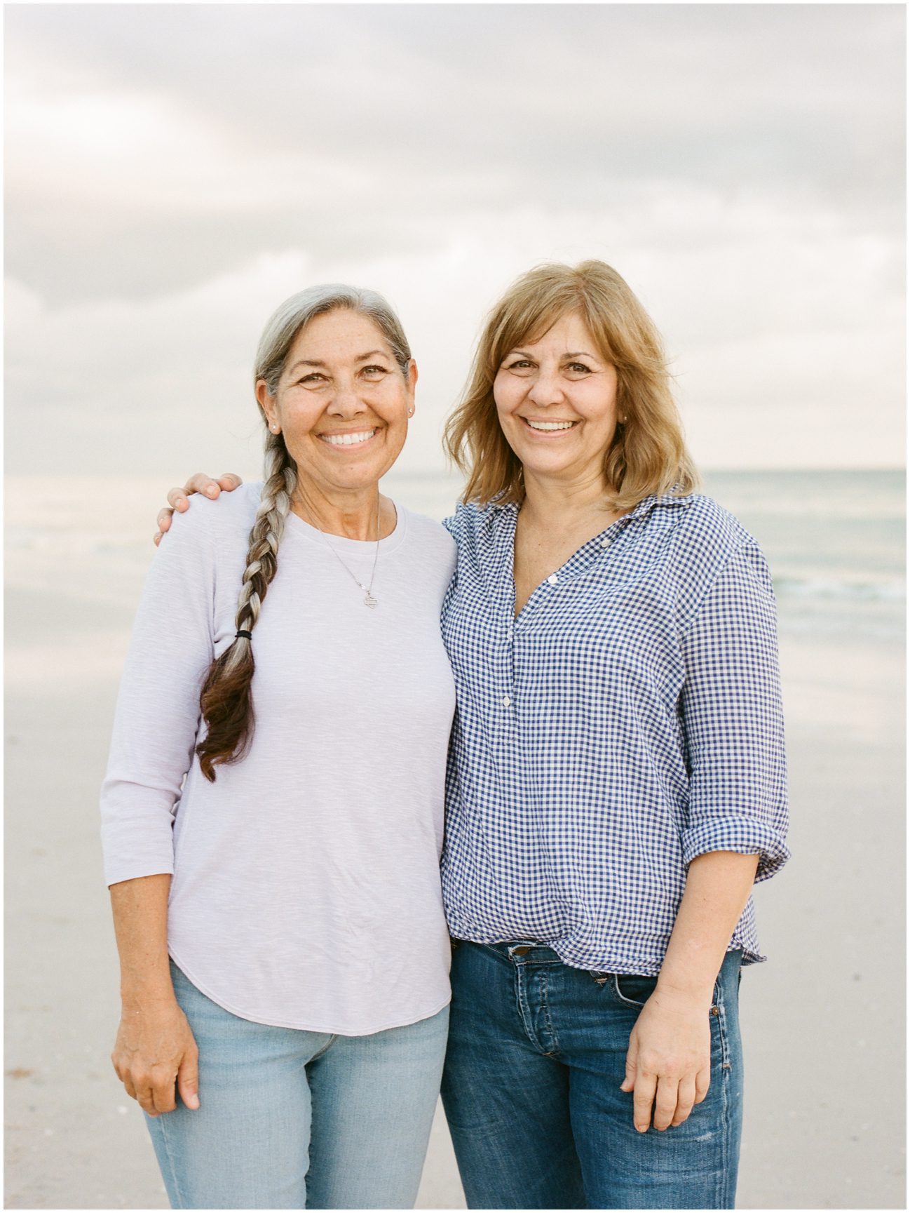 Photo of two sisters on the beach in Naples Florida